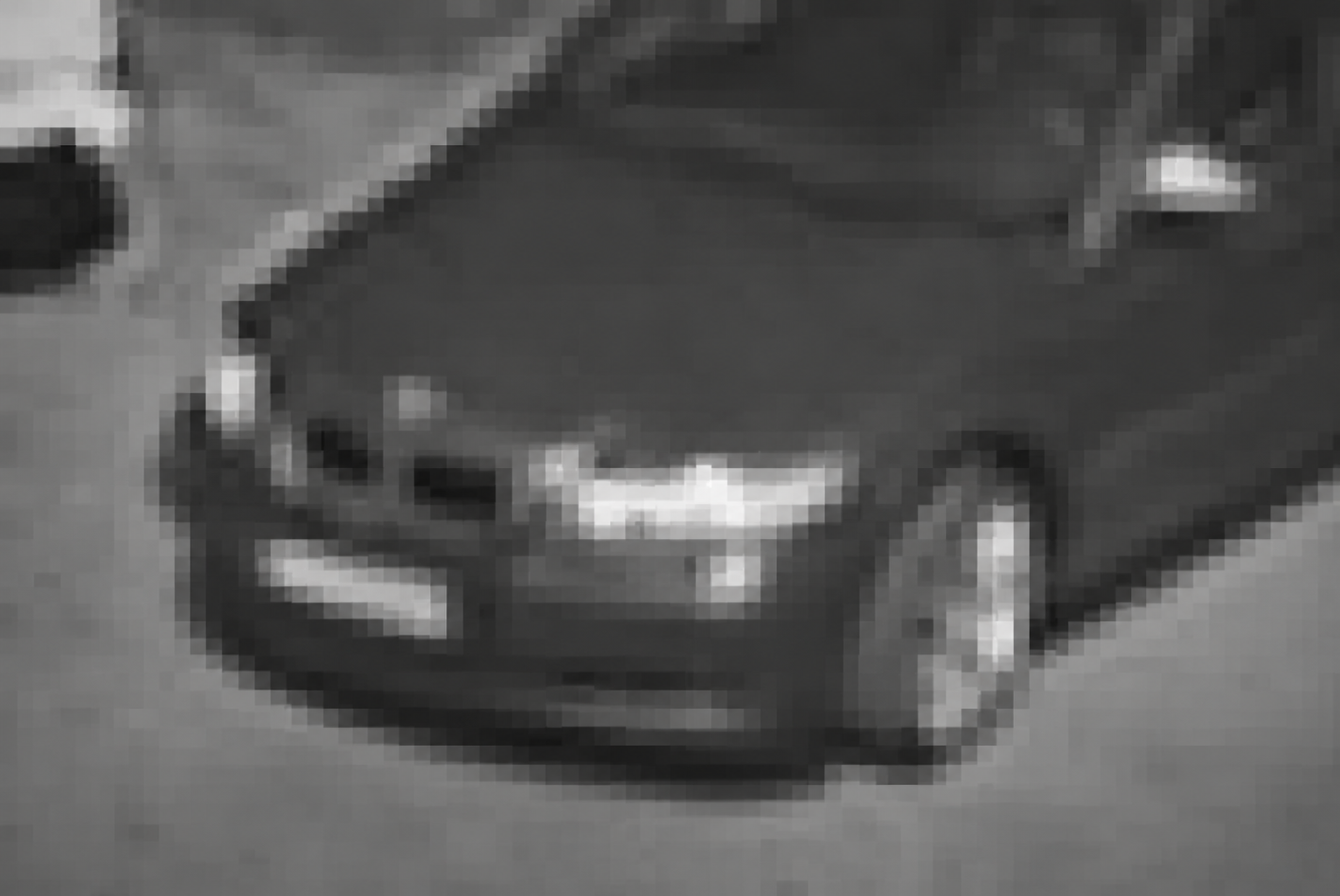 Downsampled grayscale model view of the same vehicle